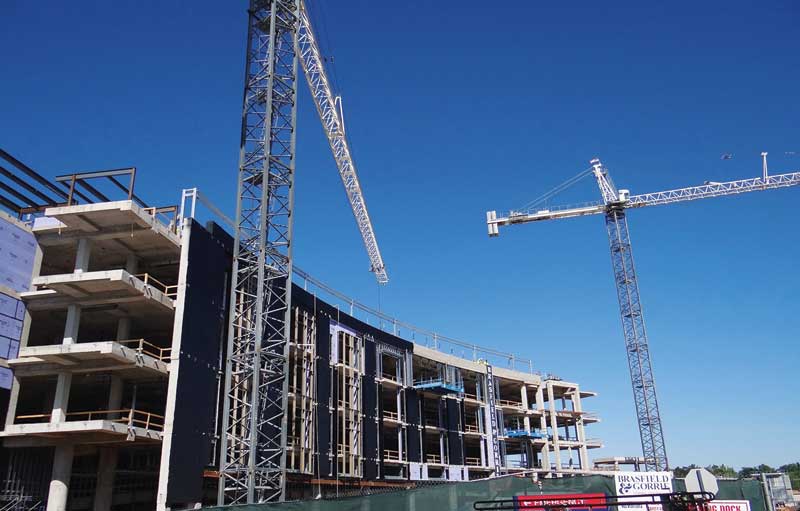 The new North Tower under construction at the Moses H. Cone Memorial Hospital specifies 40 percent cementitious replacement with slag cement to earn points toward its Silver certification under the LEED-HC program. Photo courtesy Triad Business Journal