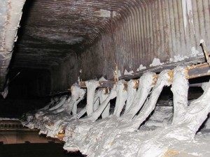 An area of intact plaster, showing the connection system (plaster wads) and ornamental ceiling panels below. Photos courtesy Kenneth M. Itle