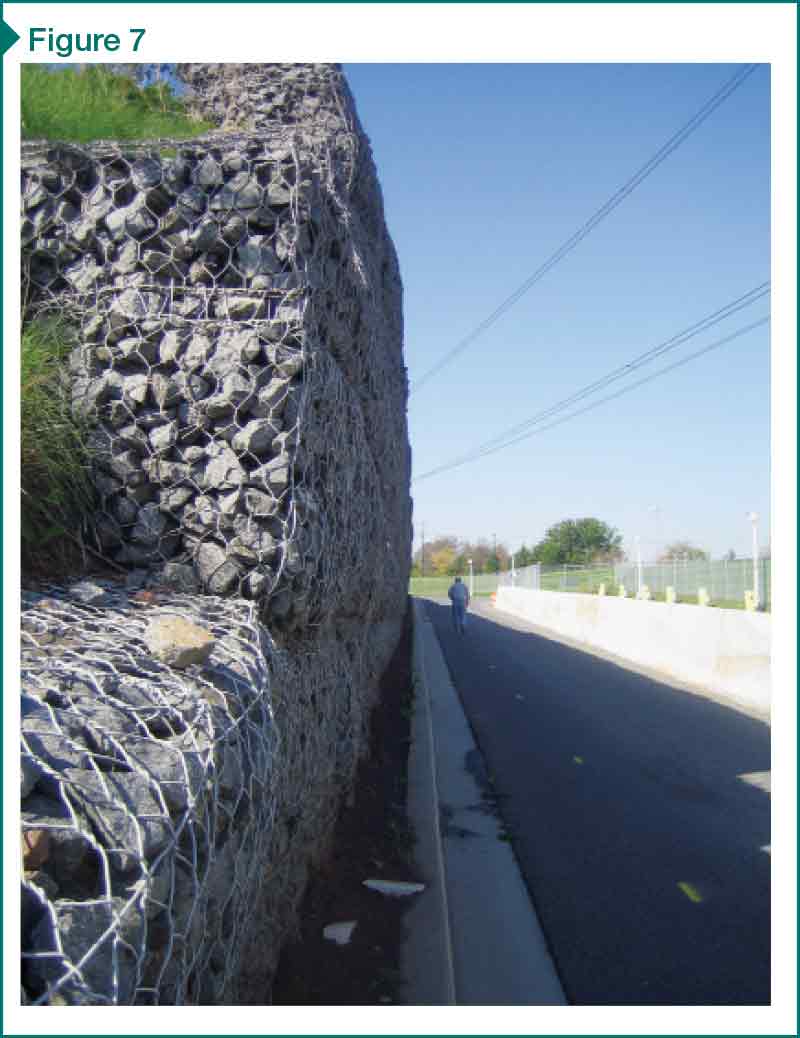 Overhanging MSE wall from horizontal movement. The wall was originally constructed with a vertical face and no inward batter.