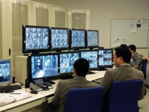 Security professionals at China’s Shanghai World Financial Center monitor the video surveillance system which provides real-time views of critical areas throughout the 104-story building.