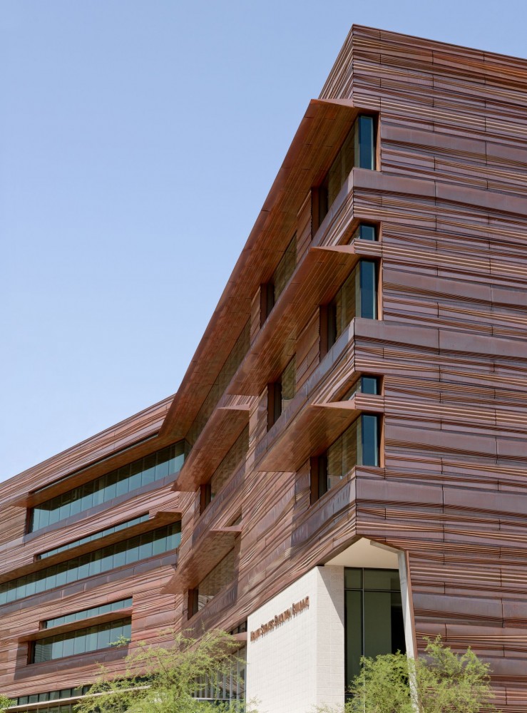 The Health Science Education Building (HSEB) has a complex copper façade exterior that blends nicely into the Arizona landscape.