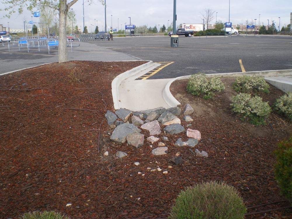 One way water may enter the bioswale from the parking lot.