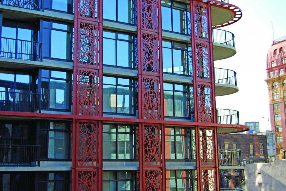 Vancouver, B.C.’s W Tower (Woodwards Building) displays intricate decorative panels protected by a duplex system.