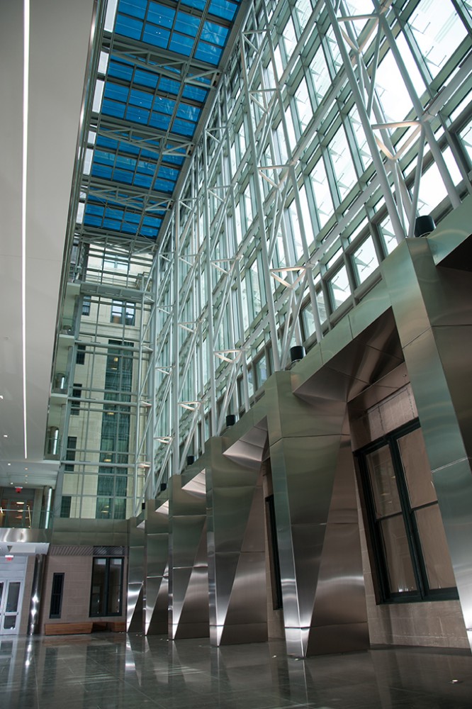 The renovation of the General Services Administration (GSA) headquarters included a seven-story atrium built atop a formerly open-air courtyard. Electronically tintable dynamic glass was chosen for the atrium’s skylight to provide a comfortable environment for occupants, reduce energy usage, and demonstrate how green technologies are being incorporated into renovated buildings. [CREDIT] Photo courtesy Sage Electrochromics. Photo ©Montana Pritchard Photography 