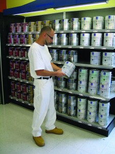 A professional is selecting paint for a project. Photo courtesy Sherwin-Williams 