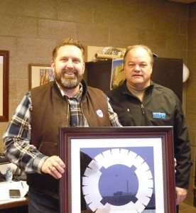 Senator John Pederson, Senate District 14 in Central Minnesota, receives the Government Official of the Year Award from IGGA’s Terry Kraemer of Diamond Surface Inc.