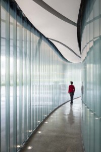 Designed by NBBJ, the John Lo Schiavo Center for Science and Innovation at the University of San Francisco has a channel glass façade that moves between curved and straight sections. Photo courtesy NBBJ