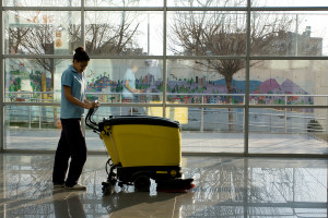 A worker cleans this floor with a specialized machine. Photo © Bigstock.com