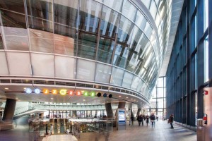 Figure 4: In the busy transit station that is New York's Fullton Center, a steel curtain wall system forms a circular, enclosed space that houses restaurants and retail shops. Photo courtesy TGP