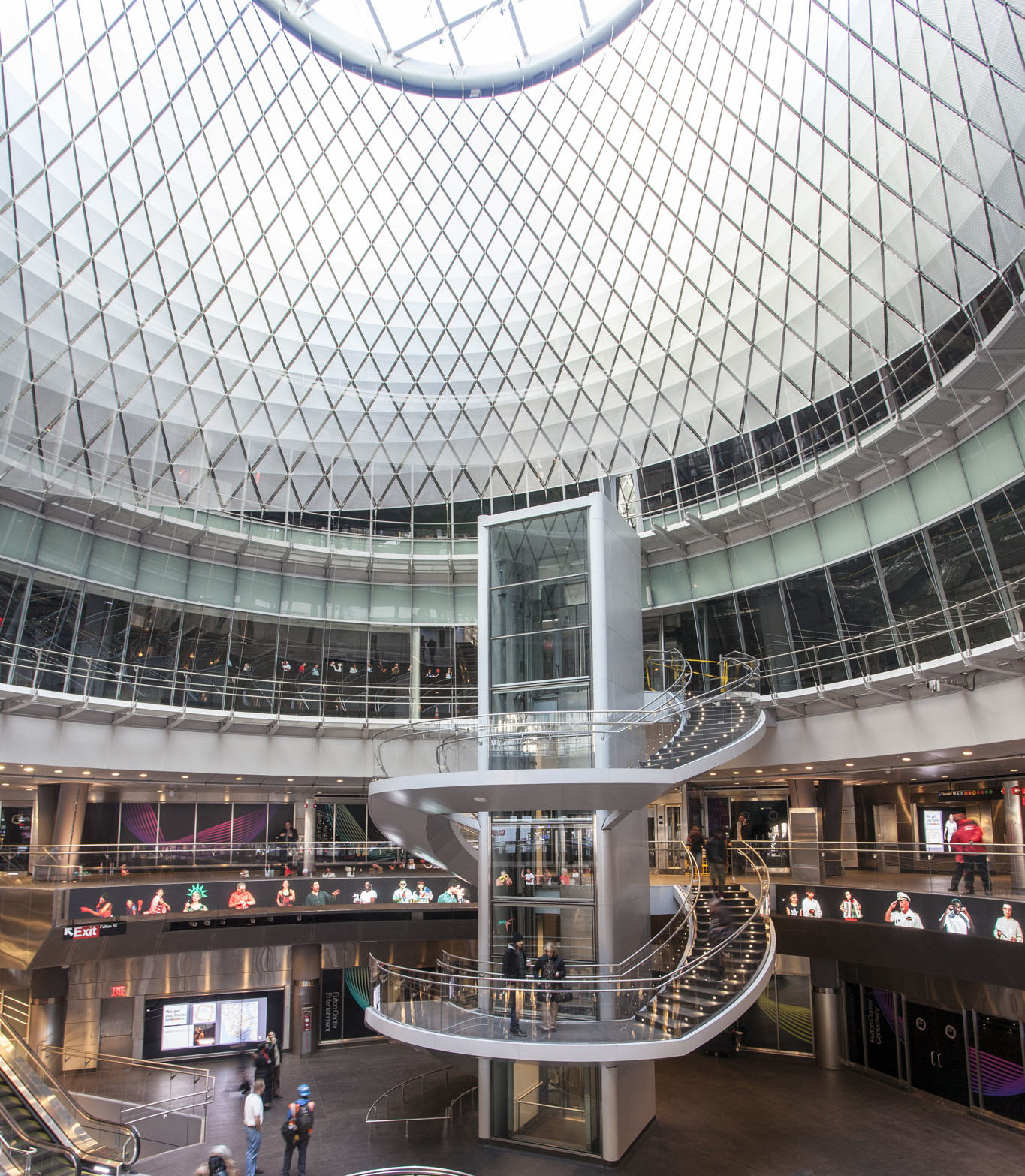  Fulton Center’s Sky Reflector-Net captures sunlight and helps direct it into the subway’s lowest levels. Photos courtesy Technical Glass Products