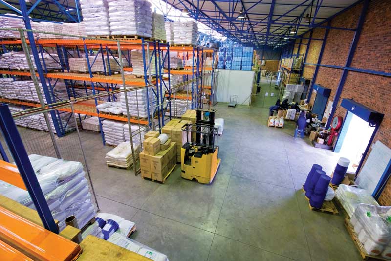 Warehouses, like the one above, can have improved air ventilation and temperature regulation with HTHC units, ensuring proper temperature for materials and workers. Photo © Bigstock.com