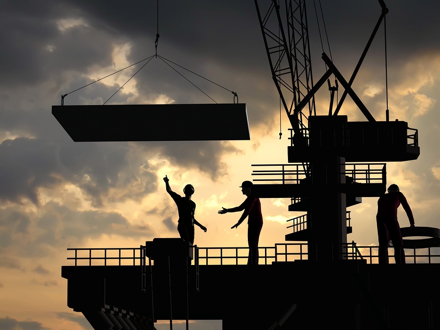 Construction of a building on a background of the sky