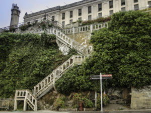 The seven participants of the Concrete Preservation Institute’s (CPI’s) field school this fall were tasked with restoring the staircase of the main cell house on Alcatraz Island. Photo courtesy BASF