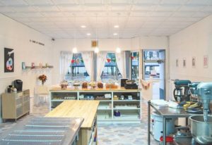 A decorative hygienic ceiling was used throughout this cupcake bakery to visually unify the food preparation and dining areas. Photo courtesy Ceilume