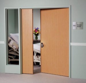 Partially open door to a patient room