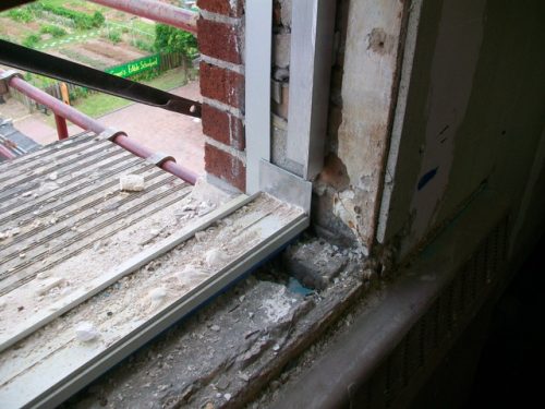 The wooden window frames had not been attended to in more than 50 years.