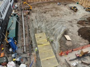 Aerial view of the Platte 15 site in Denver. Clear view of the completed ejector pump station, groundwater filtration equipment, and ejector wells along the north side of the excavation are visible. Photos © Josh Peltier of TerraFirma Earth Technologies