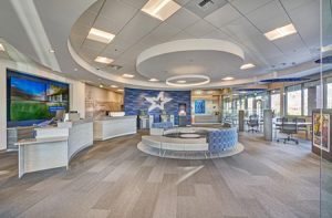 Contemporary ceiling design transforms the interior of the Travis Credit Union Vaca Commons Branch Image courtesy Rockfon