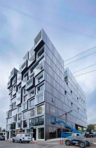 The architectural aluminum exterior elements of the 10-story, mixed-use Slate development in Portland, Oregon, showcase six colors and two finishing methods that enhance the building’s aesthetics. Photo © Joshua Jay Elliott. Photo courtesy Works Progress Architecture and Wausau Window and Wall Systems