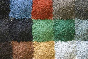 Asphalt shingle granules offer a diversity of colors and blends to suit many environments, climates, or terrains. Photo courtesy Asphalt Roofing Manufacturers Association