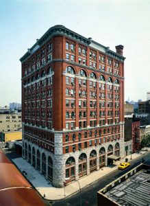 The Shephard Warehouse was built in the late 19th century as a 12-story newsprint storehouse. The construction was of steel columns, girders, and beams with brick arch infill. This made it an excellent candidate for conversion into a rental housing building.