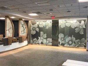 Health Insurance Portability and Accountability Act (HIPAA) regulations can impact medical building design. This patient check-in area at Duke University Medical Center includes privacy features.