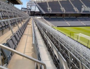 A safe standing system with integrated seating has been utilized at the Los Angeles Football Club’s (LAFC’s) Banc of California Stadium. Photo courtesy Trex Commercial Products