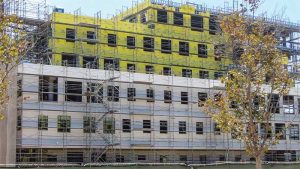 Figure 7: Building scaffolded for installation of thin brick.