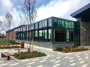 A school cafeteria’s exterior appearance provides no hints that the glazing system employed in this project actually has security glass.