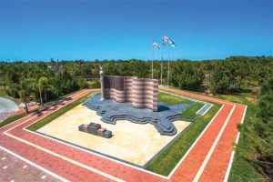 Mesabi Black pavers and treads create a base shaped as the United States, and Kasota Valley Limestone pavers surround the front of the base of the Collier County Freedom Memorial in Naples, Florida. Domestic fabrication and material was specified for this project. Photo © Albert Mountcastle