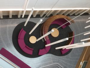 The atrium of the Health Innovation Center and Founders Hall at Northern Kentucky University (NKU) in Highland Heights, Kentucky, consists of multiple semicircle-shaped couches that are affixed to the floor and arranged to form an ‘S’ shape. Images courtesy Stala Integrated Assemblies