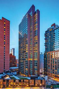 To create an industrial metallic look, more than 8574 m2 (92,000 sf) of the aluminum wall panel system on the south side of the Forge, a luxury residential tower in New York City, was finished in a proprietary copper color anodize and painted an additional 446 m2 (4800 sf) in black iron. Photo © Arch Photo, Inc./Eduard Hueber. Photo courtesy Linetec