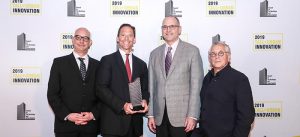 The Salesforce Tower project team with their ‘Best Tall Building Worldwide’ trophy awarded by the Council on Tall Buildings and Urban Habitat (CTBUH) awards program. Photo courtesy CTBUH