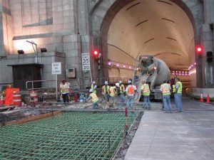 In this high traffic location, short closure periods were required when repairing the Lincoln Tunnel. Repairs are shown to the concrete approaches on the Weehawken, New Jersey, side.