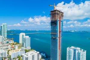 Miami’s Arquitectonica-designed Elysee tower tops off at 57 stories. Image courtesy Two Roads Development