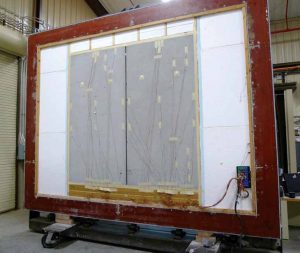 ORNL performed hot box tests as per ASTM C1363, Standard Test Method for Thermal Performance of Building Materials and Envelope Assemblies by Means of a Hot Box Apparatus, to measure the performance of current industry standards. 