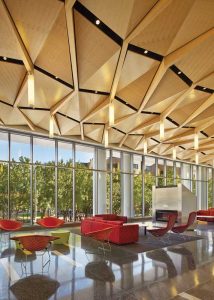 Wood ceilings can provide eye-catching aesthetics along with effective acoustical performance, making them a versatile and functional design element. They can also become a focal point in signature spaces.