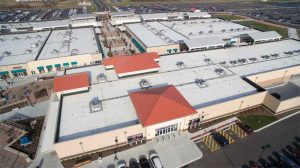 The reroofing of the St. Charles Parish and School in Spokane, Washington, with a reinforced, 1.5-mm (60-mil) TPO membrane preserves an important era in the evolution of modern architecture, featuring an irregularly shaped roof. Photo courtesy St. Charles Parish & School