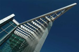 Reminiscent of a shiny badge, Colorado’s District 2 Denver Police Station’s exterior cladding system sparkles with champagne metallic architectural coatings.