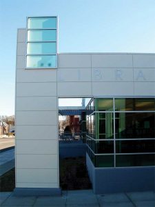 The façade of the Lamar Public Library in Colorado showcases silver metallic architectural coatings on an aluminum panel system. Photos courtesy Dri-Design and Linetec