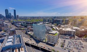 Fenway Center, a highly anticipated air-rights complex, is set to open its first phase, called Bower, this summer in Boston, Massachusetts. The project will reconnect three neighborhoods with new housing and open space. Image courtesy TAT