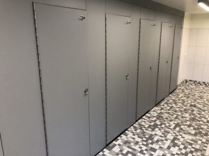 Madrona Hall at the University of Washington, Seattle, utilized high-density polyethylene (HDPE) partitions to create privacy for its co-gender restroom design. Photo courtesy Scranton Products