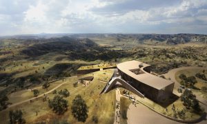 Studio Gang’s design for the Theodore Roosevelt Presidential Library is conceived as one of the Badlands’ rock formations, the building emerges from the land as if carved away by water and wind. Image courtesy Studio Gang