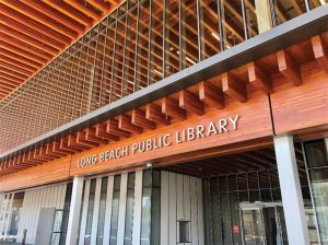 Designed by Skidmore, Owings & Merrill, the Billie Jean King Main Library, Long Beach, California, is a hybrid building, developed over an existing parking structure. It includes an exposed glue-laminated (glulam) timber roof system over steel framing. Photo © W.S. Klem