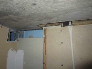 Figure 11: Gypsum wallboard partially removed.