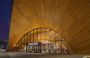 At the Charles Library, located at Temple University’s main campus in Philadelphia, Pennsylvania, the design team used western red cedar to impart a warm, inviting, natural look. Photo courtesy Armstrong Ceiling & Wall Solutions