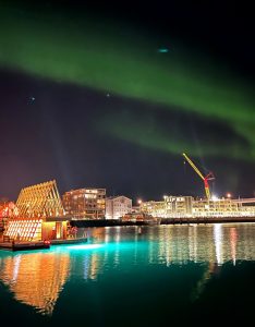 Build with treated wood, a luxury floating sauna in Tromsø Harbour, Norway, offers visitors views of the Northern Lights. Photos © David Jensen