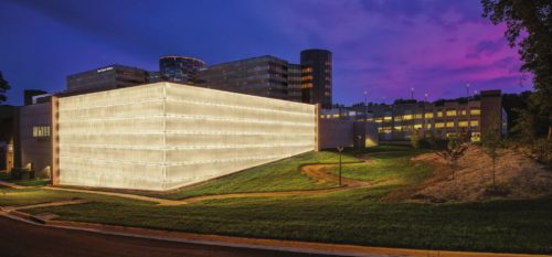 At the Inova Schar Cancer Institute in Virginia, a shingled glass rainscreen acts as a permanent moisture shield and promotes energy efficiency by managing air infiltration and heat transfer. Photo courtesy Greg McGillivray/Halkin Mason Photography