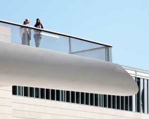 Metal fabric presents a flexible, elegant design option that is also durable—which is an ideal combination for activating a rooftop environment.