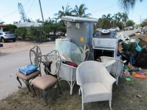 Debris collection of all the water-sodden drywall, appliances, and furniture on curbside took weeks to remove.